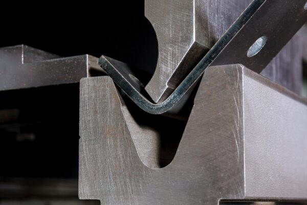 The process of bending sheet metal on a hydraulic bending machine